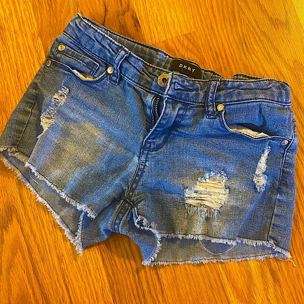 Girls youth size 10 DKNY distressed denim shorts